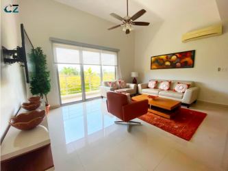 Furnished open living dining space with bright lighting in PH Soleo Panama Pacifico