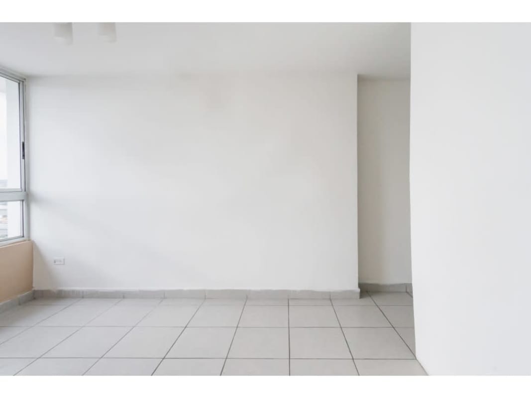 Spacious bedroom with wardrobe and city skyline view in PH Premium Tower San Francisco Panama City