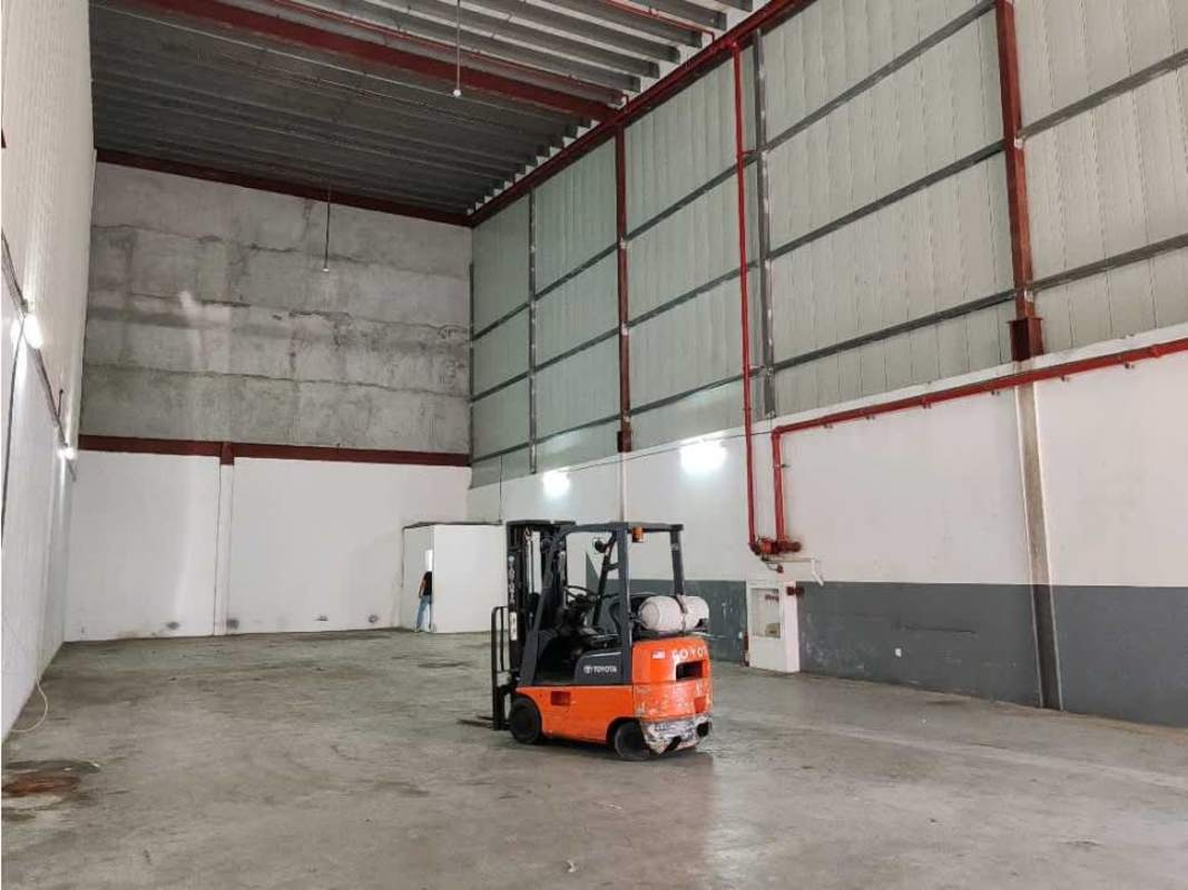 Interior spacious empty warehouse high ceilings concrete floors Don Bosco Panama City