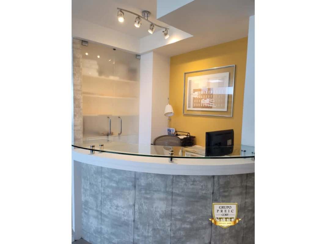 Conference room glass table mesh chairs certificates in Oceania Business Plaza Panama