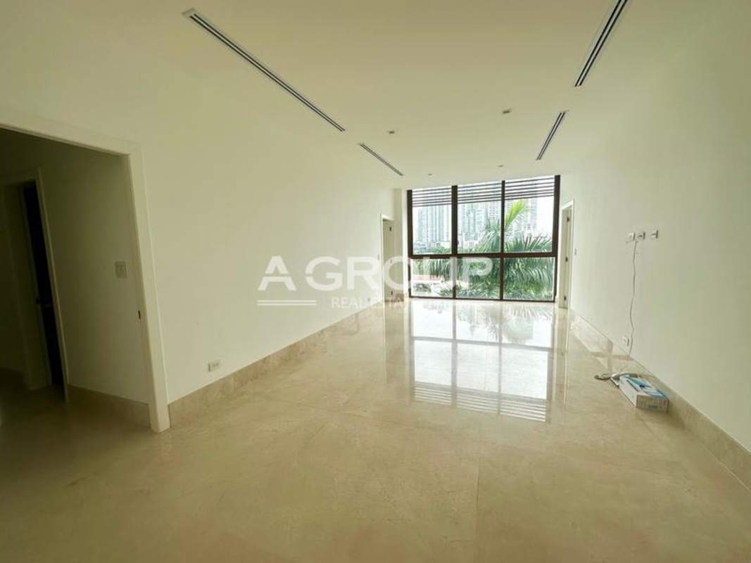 Modern kitchen with island, quartz countertops, stainless steel appliances in luxury condo on Ocean Reef Islands Panama