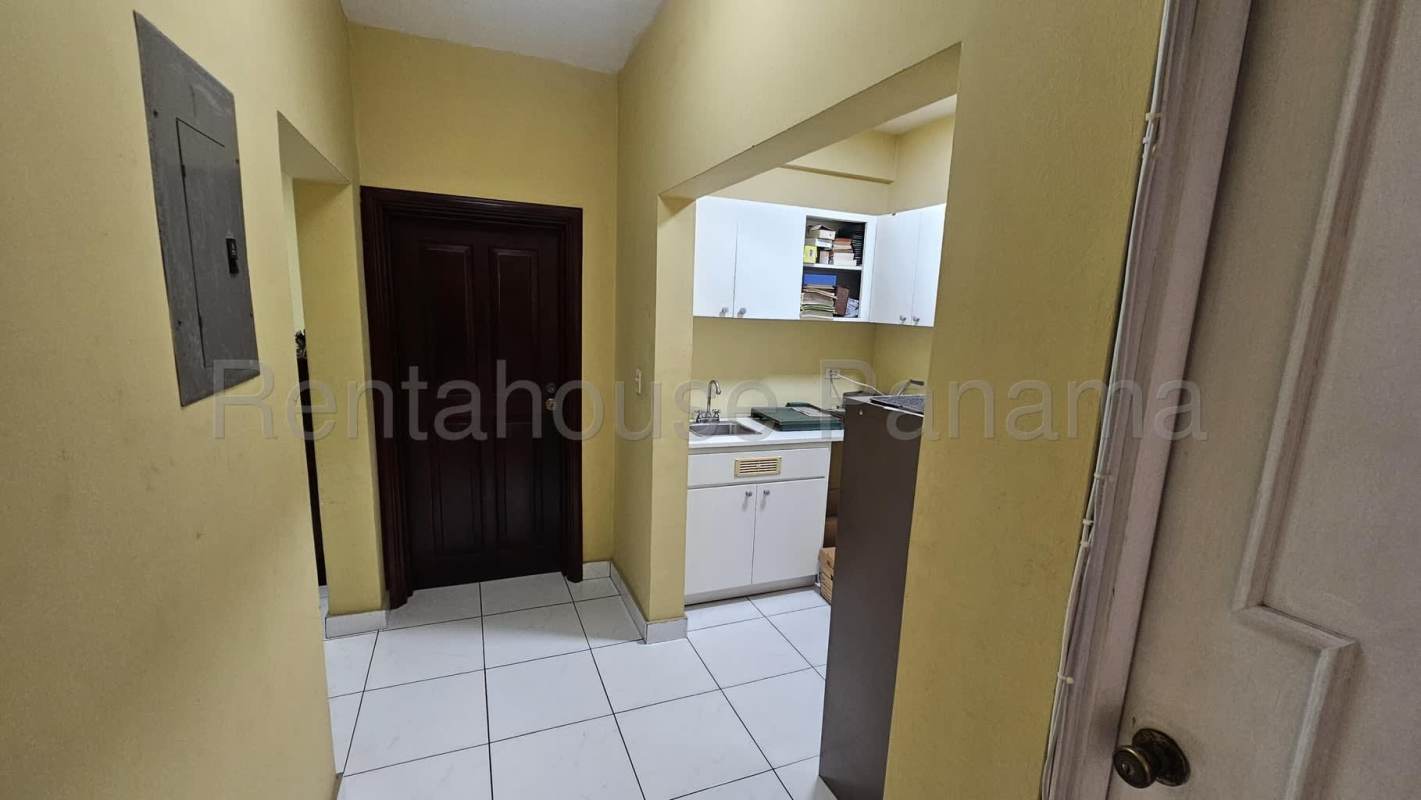 Classic kitchen with breakfast island wooden cabinetry ceramic floors Betania Panama