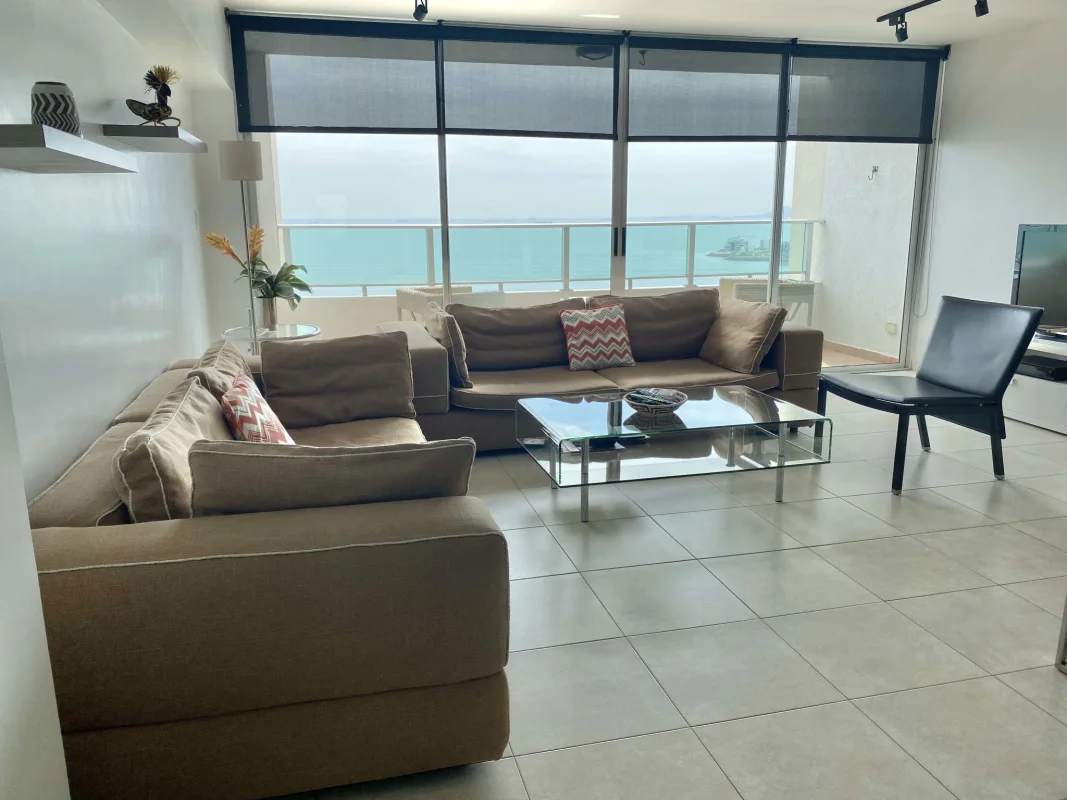 Night cityscape skyline and ocean coast view from PH Terrawind apartment balcony Panama City