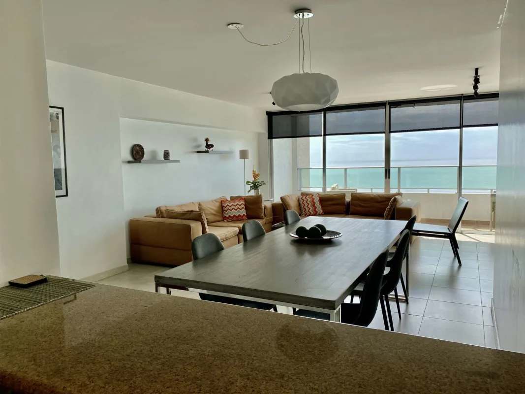 Bright bedroom with ocean view window in PH Terrawind luxury apartment San Francisco Panama
