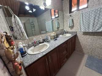 Rustic bathroom with double sink vanity granite counters El Valle Anton