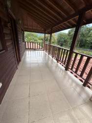 Expansive green gardens trees rustic estate house El Valle Anton