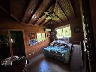 Covered wooden veranda with scenic views mountain house El Valle