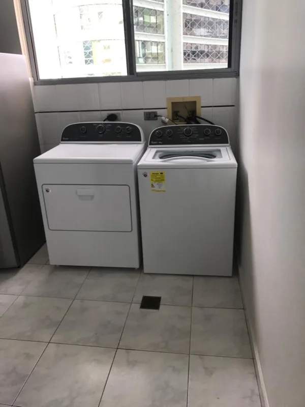 Fully tiled bathroom with walk-in shower and vanity at PH Pacific Star Punta Paitilla Panama