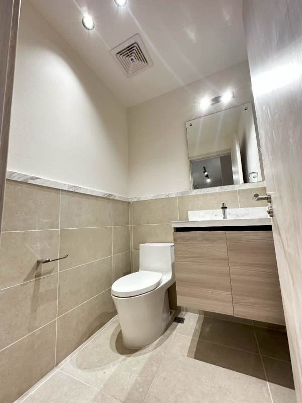 Open kitchen with modern cabinetry, appliances, bright design, in Santa Maria Panama apartment