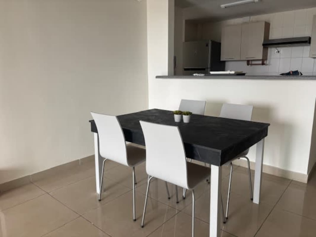 Dining and living room open space with tiled floors and balcony in PH Mirador del Golf Panama City