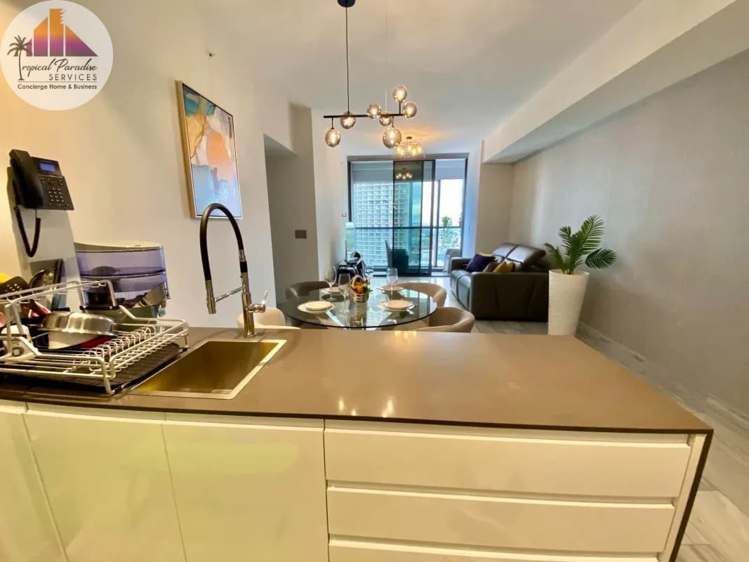 Spacious open plan living and kitchen with balcony access Costa del Este Panama