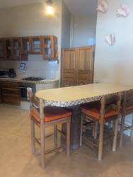 Spacious living dining room in Palenque beachfront house for sale