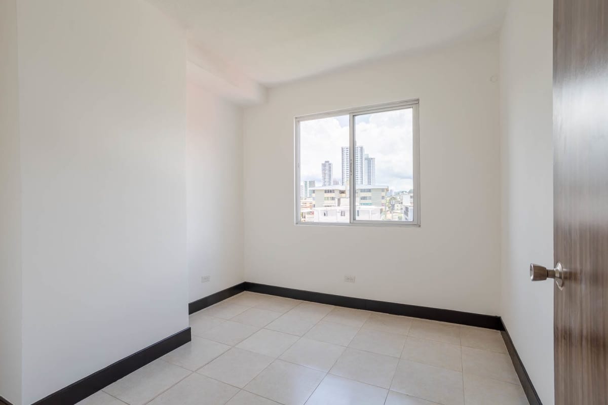 Minimalist bathroom with walk-in shower and pedestal sink PH Sorrento Parque Lefevre Panama City