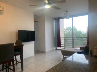 Modern apartment building with balconies and green landscaping PH Terrazas del Oeste La Chorrera Panama
