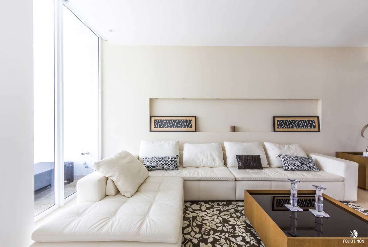 Bright open-plan living area modern furnishings ocean views The Point Punta Paitilla