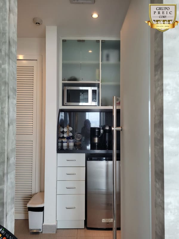 Glass wall conference room with panoramic city views in Oceania Business Plaza Punta Pacifica Panama