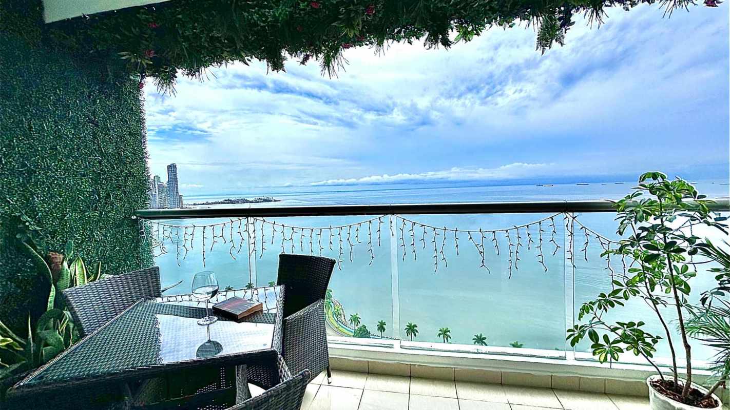 Large balcony with 180 degree ocean and skyline views in PH Rivage Panama City