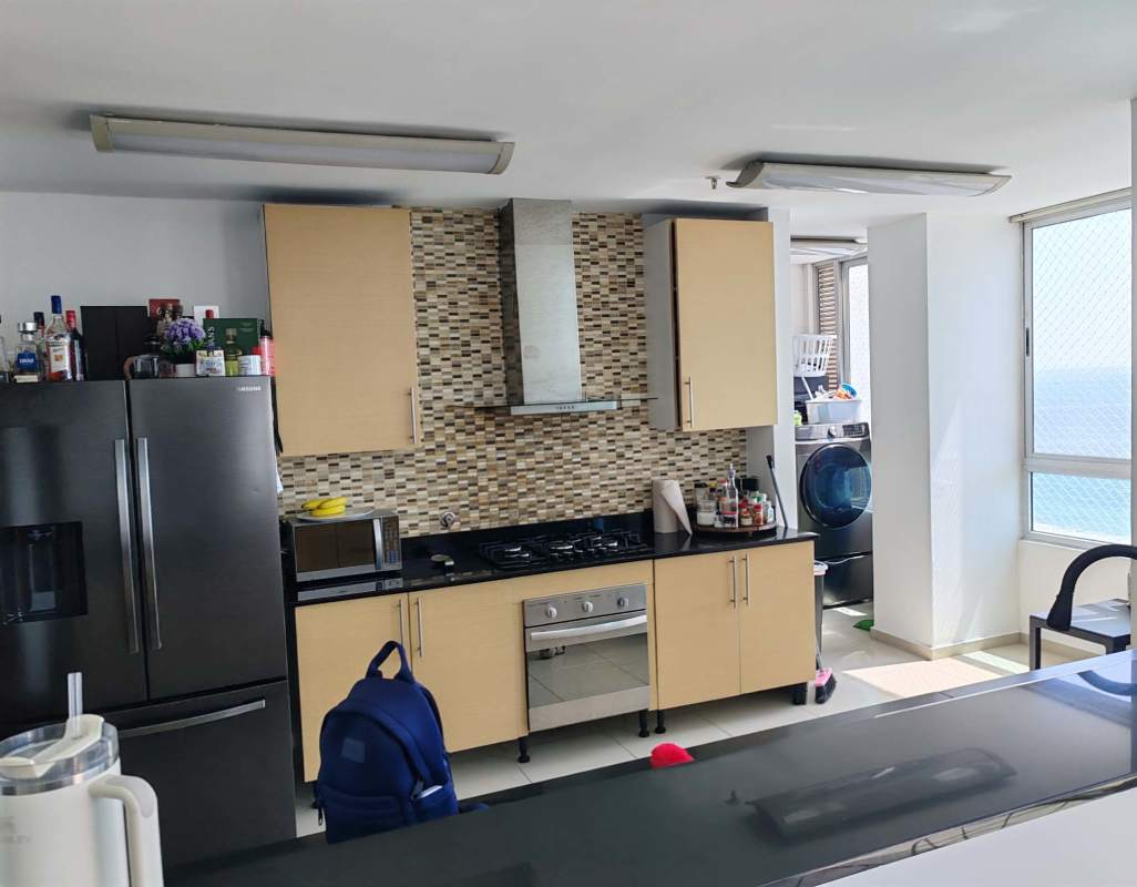 Spacious modern kitchen granite countertops, mosaic tile backsplash at PH Riverside Panama