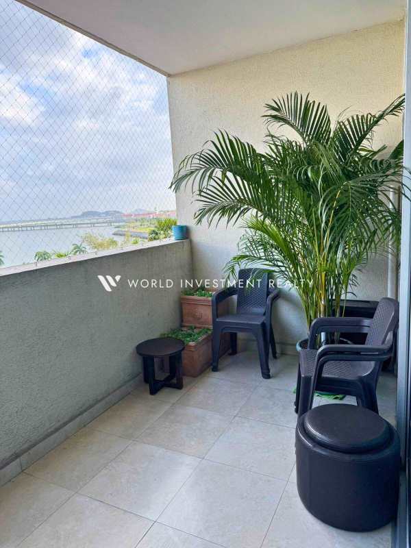Apartment balcony with water and skyline views in PH H2O Avenida Balboa Panama