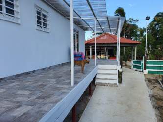Garden area with gazebo red tiled roof tropical estate Coronado Panama