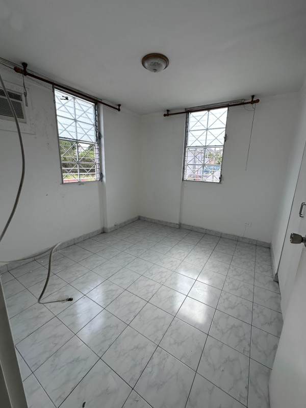 Simple bedroom with window bars, AC, tiled floors PH San Cristobal Chanis Panama