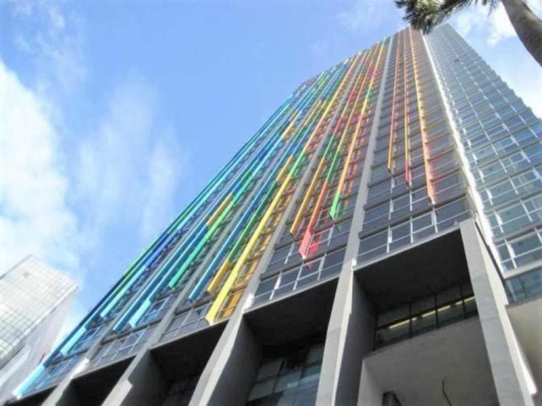 Glass balconies and colorful vertical panels on Edificio Colores de Bella Vista Panama City