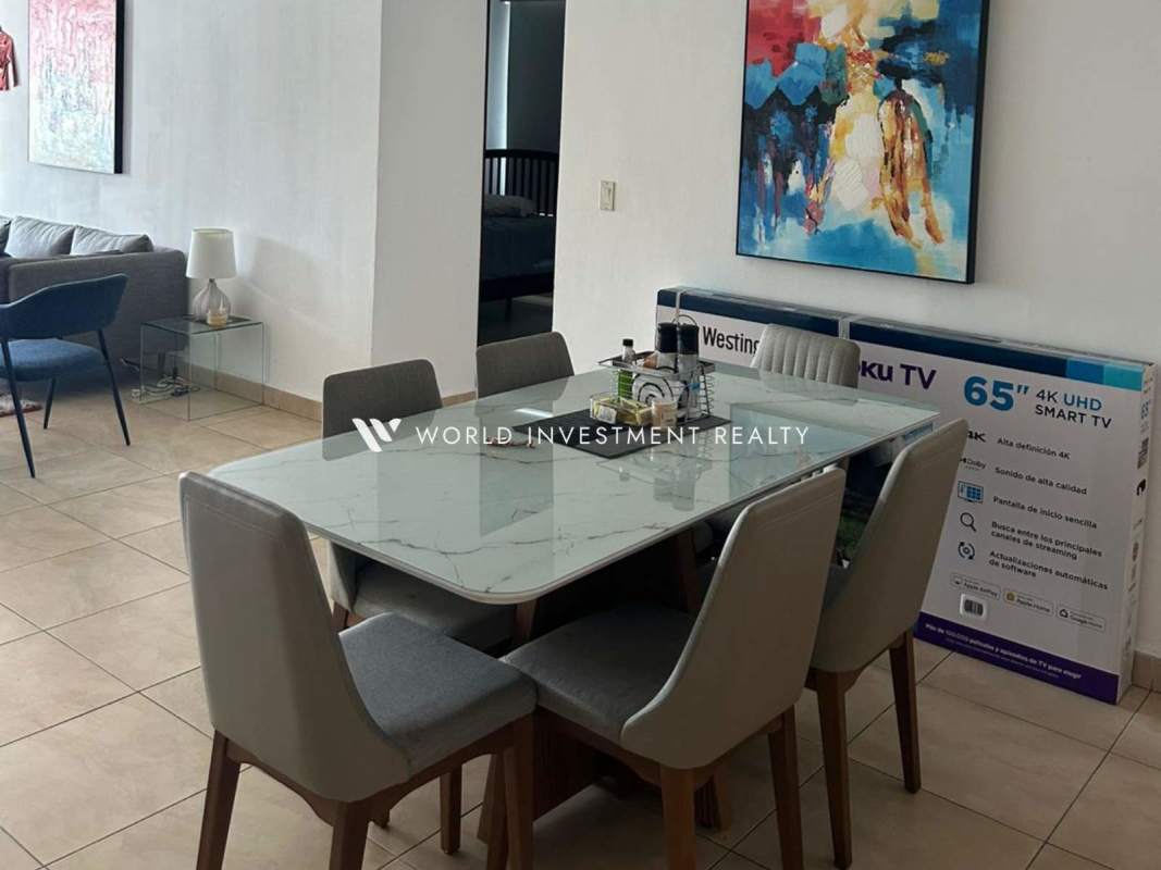 Dining room connected to bright living area in apartment for rent at PH Park City El Cangrejo