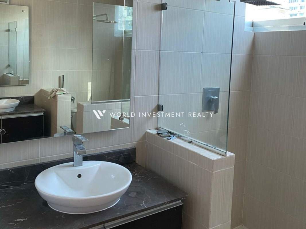 Contemporary bathroom with marble countertop, vessel sink and glass shower at PH Park City