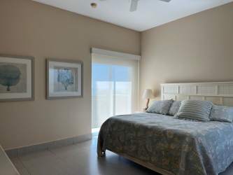 Spacious living and dining area with ocean views PH Punta Barco Resort Panama