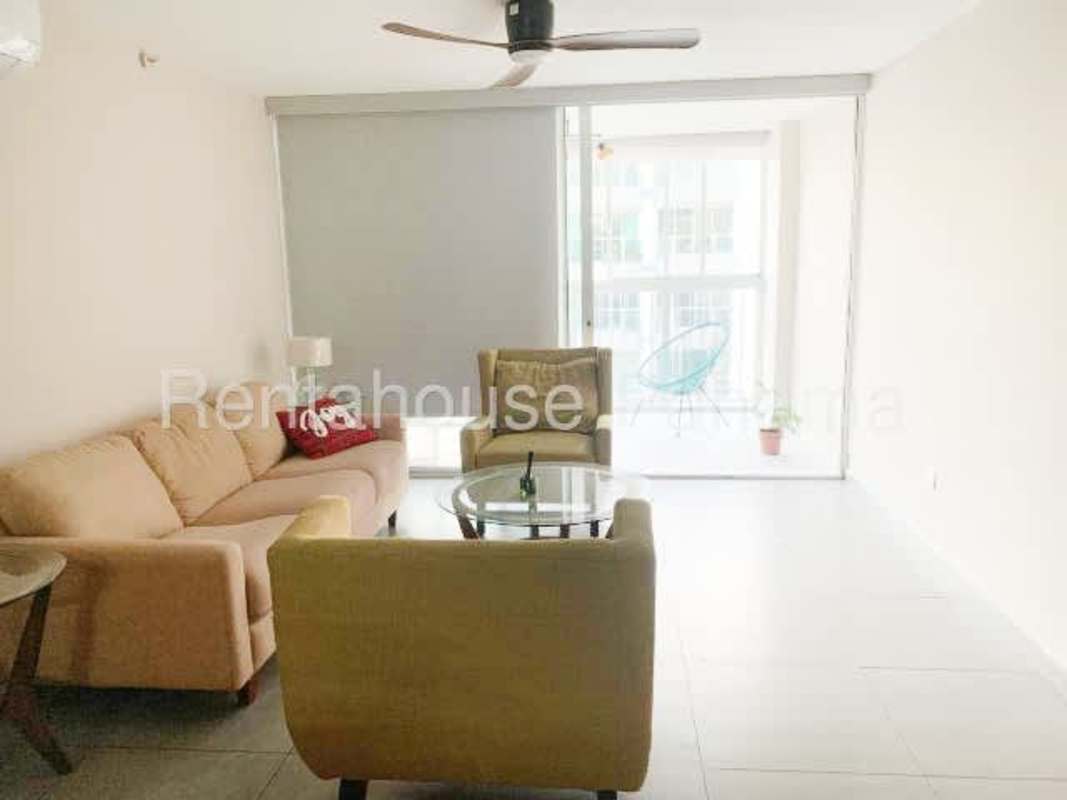 Outdoor swimming pool area with sun deck in PH Altos del Golf near Parque Omar Panama City