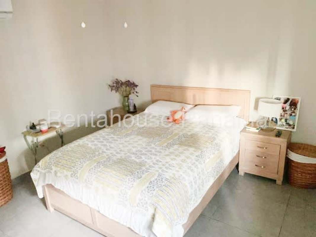 Furnished master bedroom with AC closet large window in PH Altos del Golf San Francisco Panama