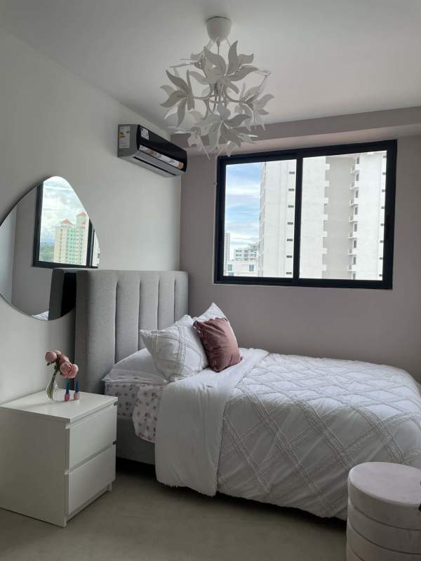 Modern minimalist bedroom with city view window PH Cranc Tower El Cangrejo Panama