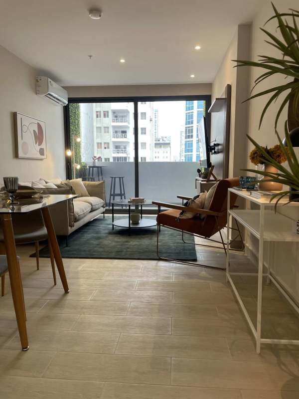 Minimalist bedroom corner with desk in PH Sky 66 San Francisco Panama