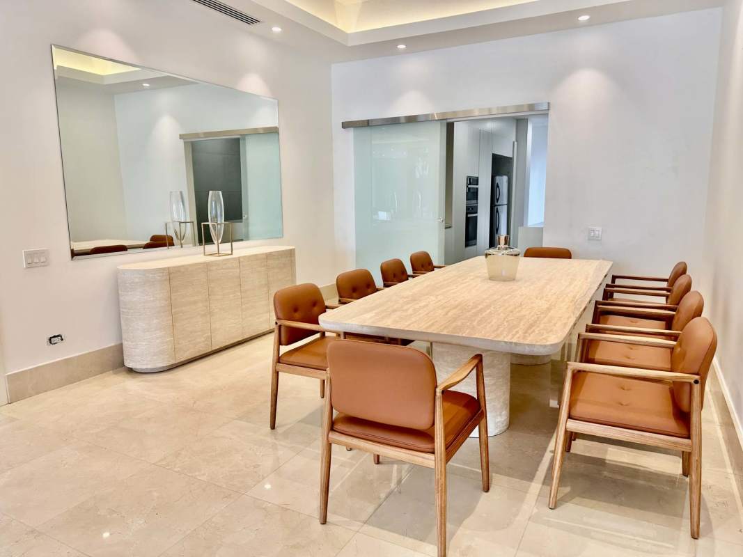 Contemporary furnished dining area with marble floors and lighting at Ocean Reef Gardens Punta Pacifica Panama