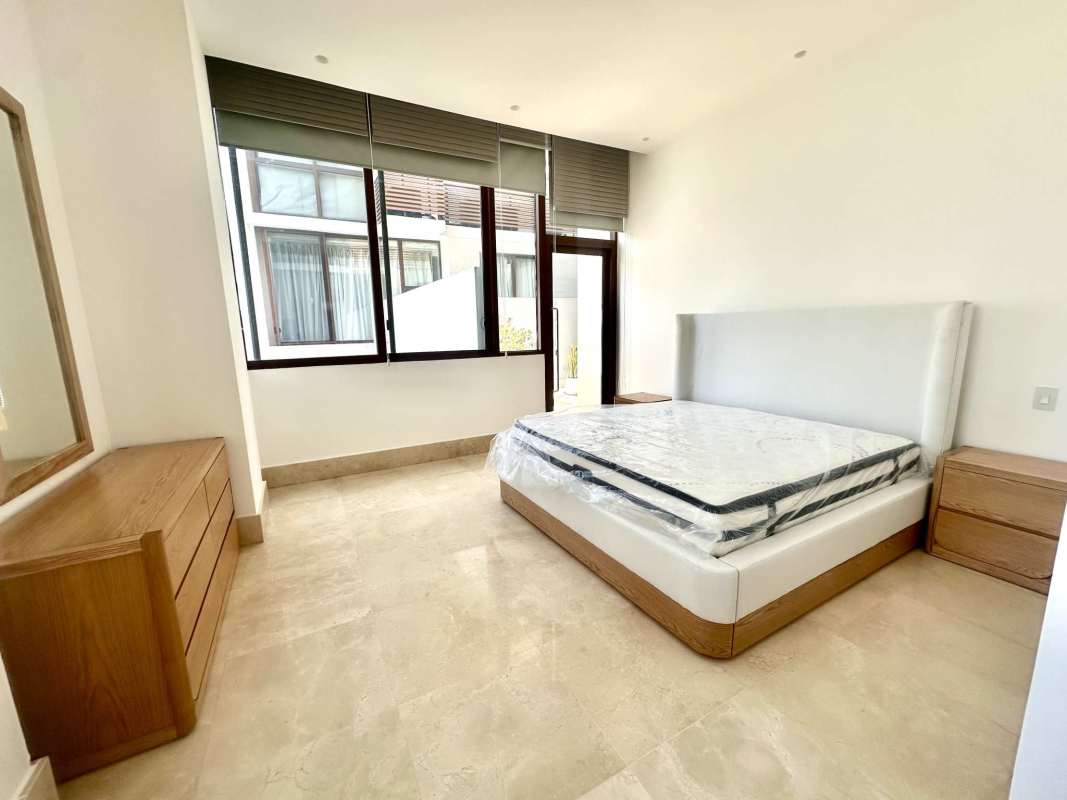 Large master bedroom marble floors big windows bright space luxury apartment in Ocean Reef Gardens Panama