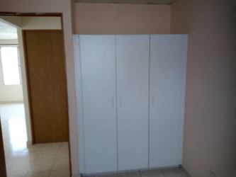 Bedroom with wardrobe and neutral decor in house for rent Hacienda Los Molinos Costa Verde