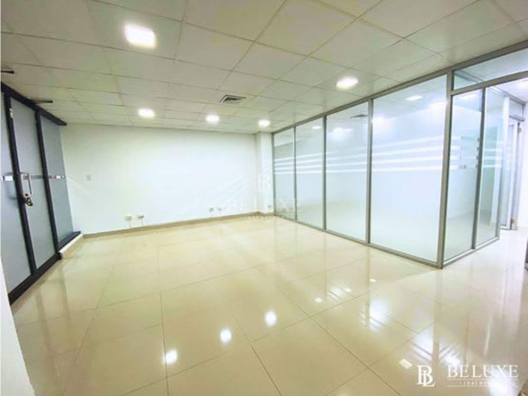 Commercial workspace interior with tile flooring and glass walls inside PH Plaza Obarrio Obarrio Panama