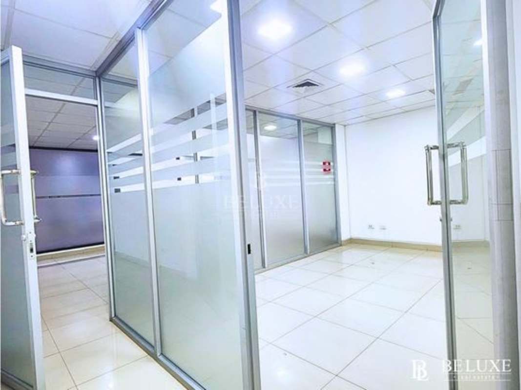 Office suite with glass wall partitions, tiled floors, modern lighting in PH Plaza Obarrio Obarrio district