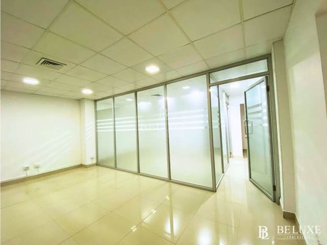 Modern office with frosted glass partition walls and tiled floors in PH Plaza Obarrio Obarrio Panama