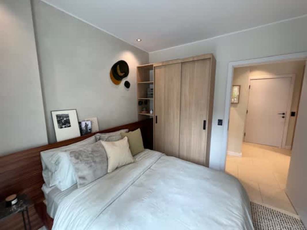 Kitchen in PH Amara El Cangrejo with induction range and sleek cabinets