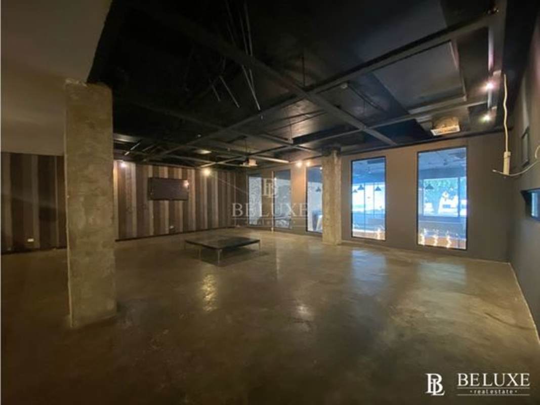 Modern commercial building glass front with visible street in PH Plaza Obarrio Panama City