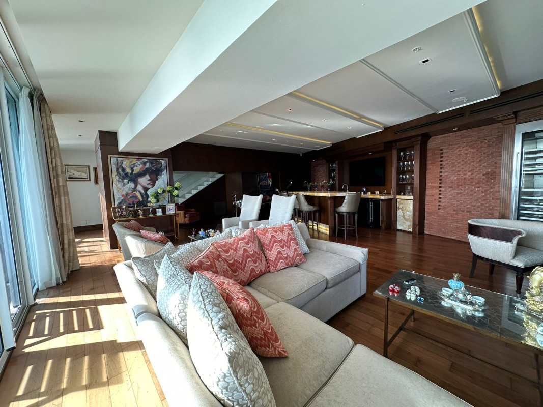 Modern luxury kitchen with granite counters and premium appliances in The Point Punta Paitilla