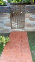 Blue tiled bathroom with shower in beachfront house Nueva Gorgona