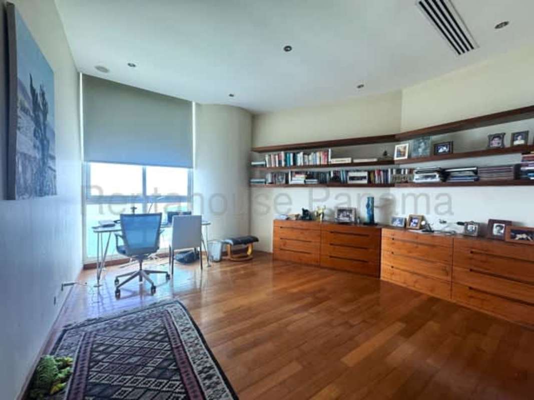 Luxury master bathroom with jacuzzi tub panoramic window ocean view in PH Ocean One Panama