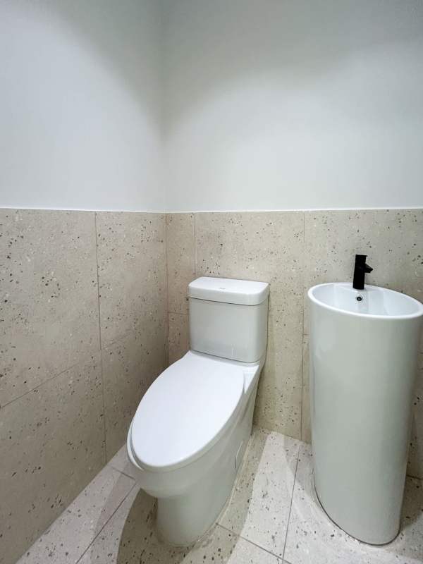 Modern conference room with large table and glass wall at Costa del Este Business Tower Panama City