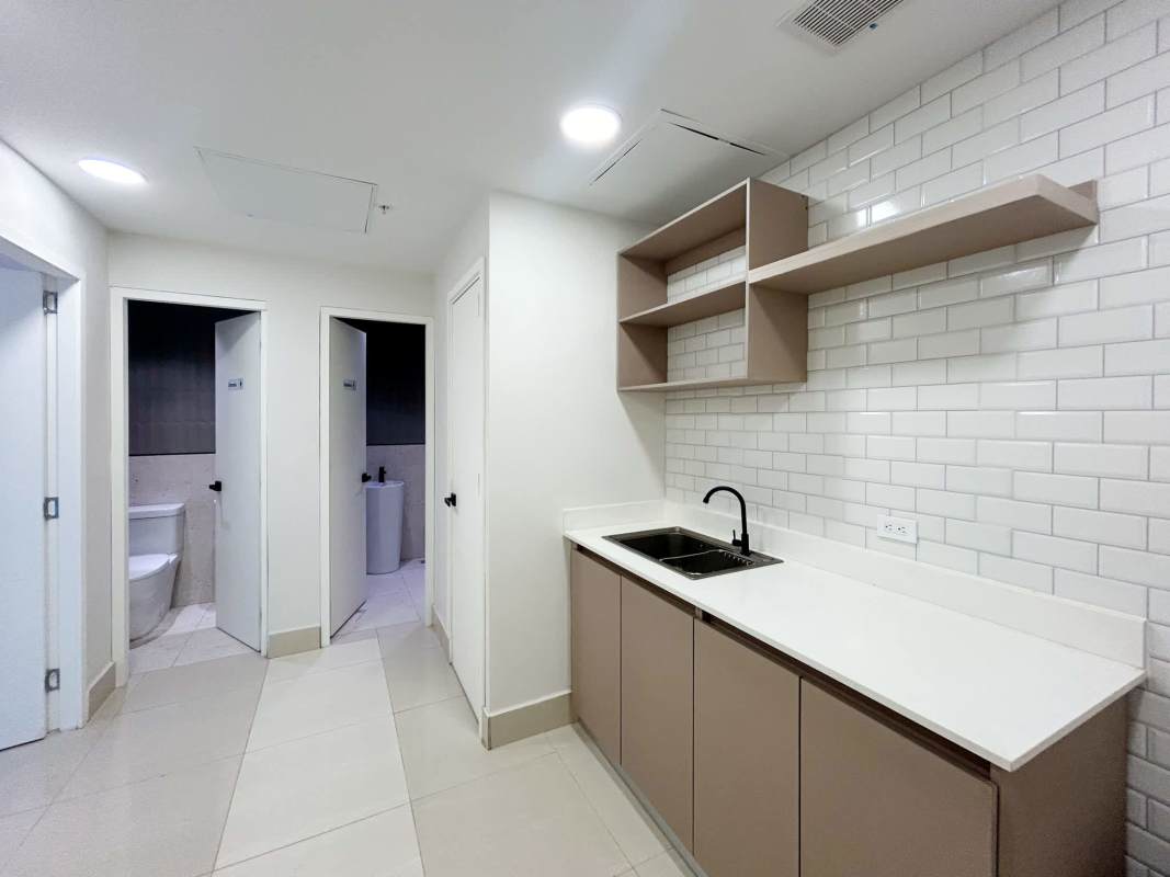 Minimalist conference room with white table and black chairs in Business Tower Costa del Este Panama City
