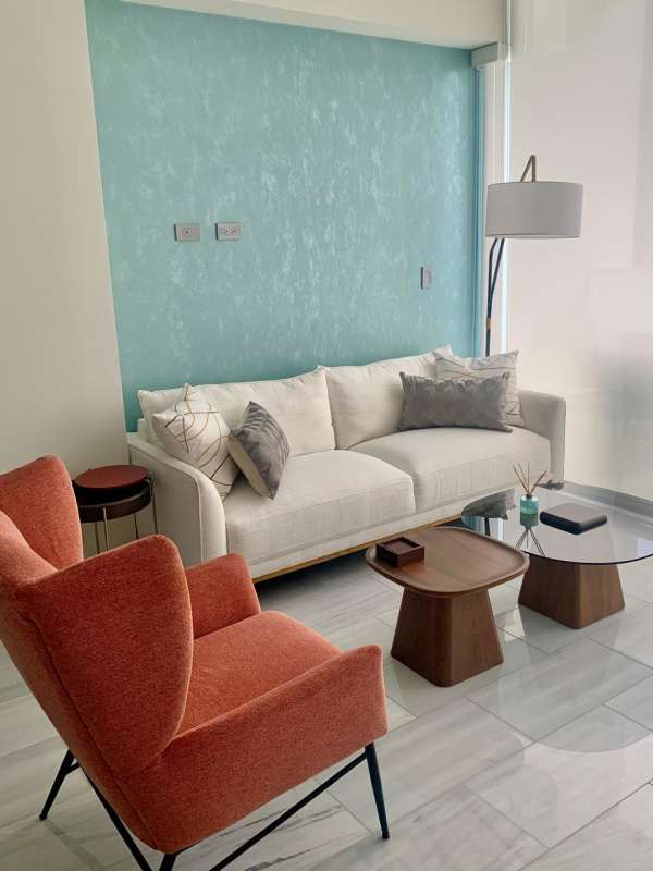 Luxury furnished living room balcony view Panama City PH Nuovo Armani Casa for sale