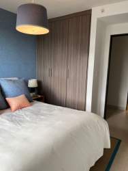 Bedroom with big window, closet and modern finishes in PH Madeira Panama Pacifico