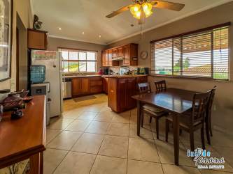 Comfortable living area with sliding doors opening to balcony Boquete condo