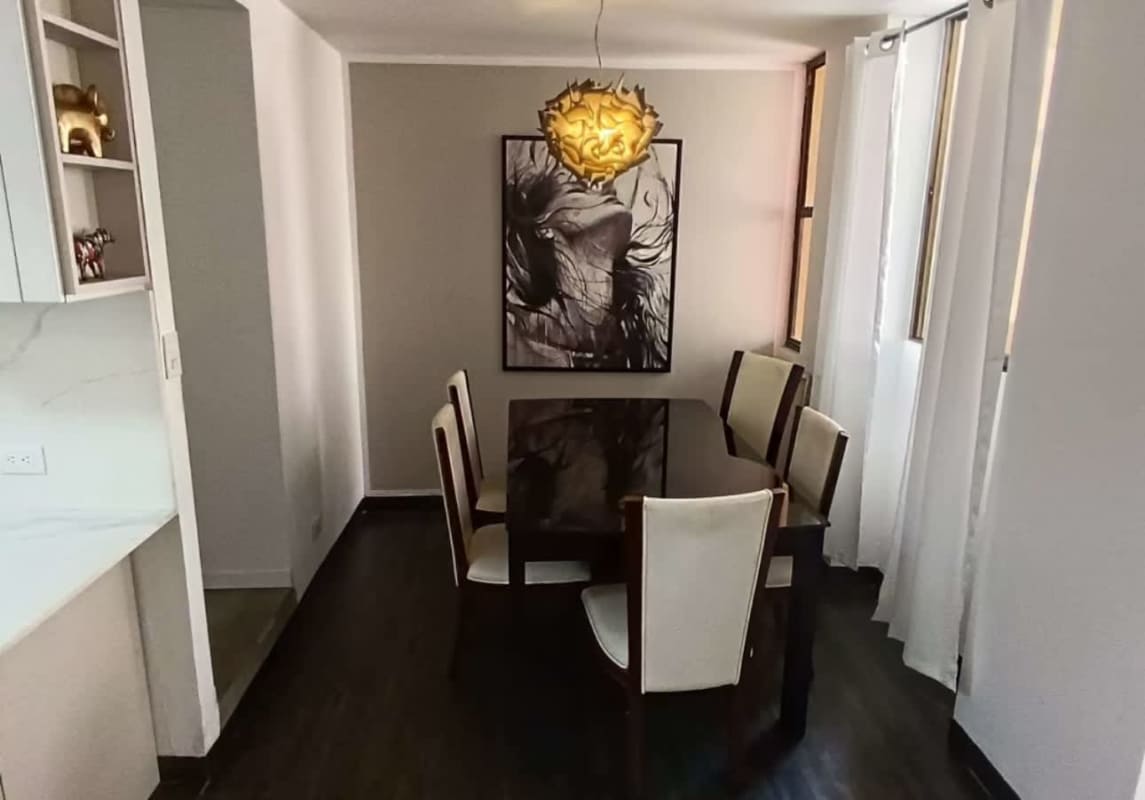 Compact modern bathroom with mirror, sink, and toilet in PH Nuevo Hato Pintado Panama